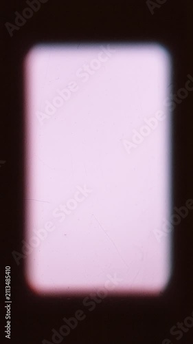 Vertical vintage film frame overlay featuring a soft rounded matte, dark vignette borders, and subtle retro dust and scratches.