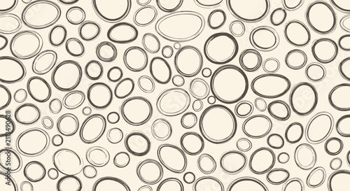 Intricate organic circular texture seamless pattern resembling cells or pebble stones on cream background.