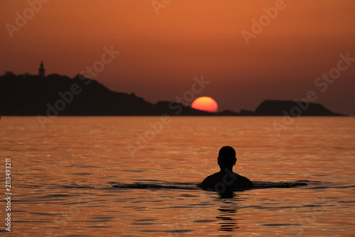 watching the sun hide away