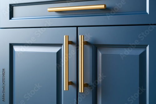Front kitchen wooden frame cabinet door and drawers. Closeup Dark Blue Kitchen. Wooden cabinet door, brass door handles, furniture base set. Trendy interior units. Home improvement concept. Samples.