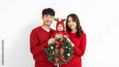 Asian Family Celebrating Christmas with Baby and Wreath on White Background