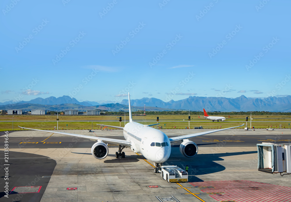 Fototapeta premium A passenger plane is leaving the apron - South Africa