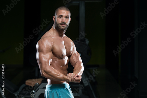 Man In Gym Showing His Well Trained Body