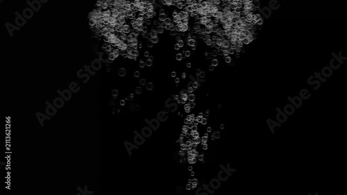 Abstract liquid particle wave of rising bubbles on a isolated black background