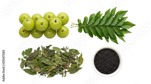 Fresh green indian gooseberry amla fruit with leaves and black peppercorns for herbal medicine and healthy food