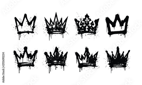 A collection of eight unique hand drawn crown illustrations created with black ink spray paint texture isolated on a white background design