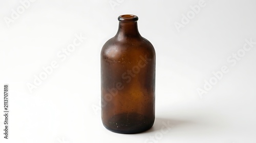 Old Fashioned Dark Brown Glass Bottle With Narrow Neck Displayed