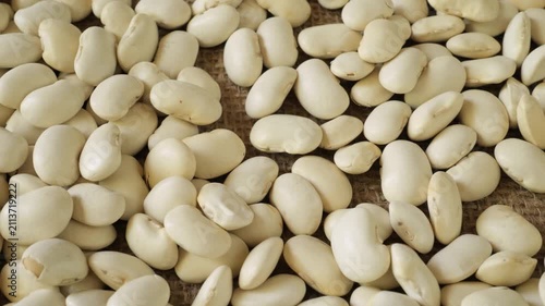 Dry white beans slowly moving for cooking preparation