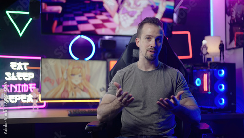 Anituber influencer streaming from anime manga geek neon lights gaming room