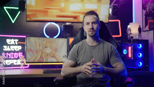 Anituber influencer streaming from anime manga geek neon lights gaming room