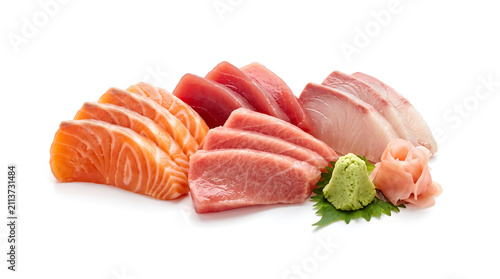 Assortment of fresh sashimi slices including salmon, tuna, and yellowtail, served with wasabi and pickled ginger on a white background.