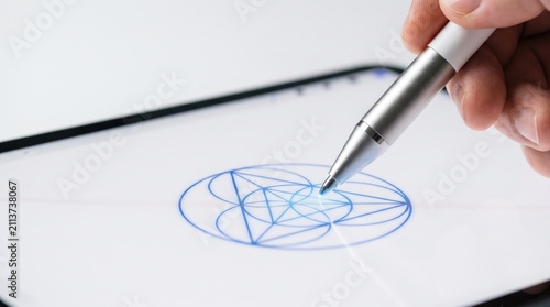 Stylus pen interacting with digital tablet screen demonstrating precision with highlighting technology digital drawing hand holding stylus touch input device digital art tools digital creativity