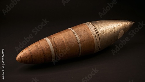 Historic Wooden and Metal Object on Black Background in a Studio Setting