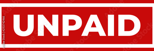 Foto Red rectangular stamp showing the word unpaid in bold white capital letters for