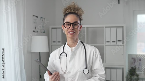 Female doctor discussing ultrasound results during video consultation