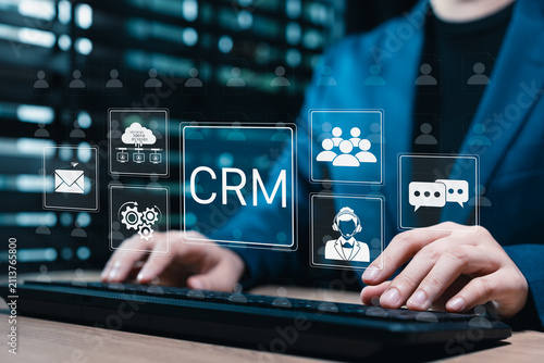 Customer relationship management system. Businesswoman using CRM software to organize client data, automate communication, support service teams, manage contacts, and improve sales workflow efficiency