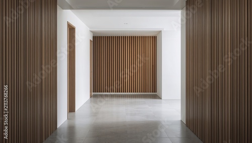 Modern Hallway With Wooden Panels and Bright Lighting in a Building