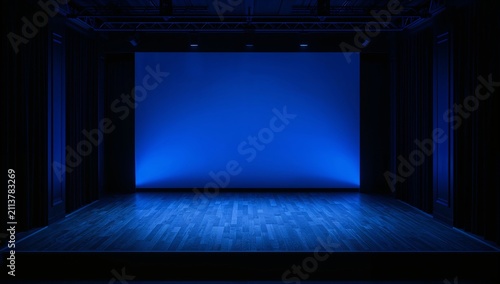 Stage Setup With Blue Lighting Prepares for Performance