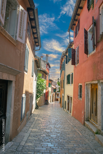 Narrow cobbled street in old town Rovinj, Istria, Croatia.