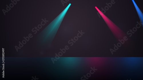 Bright colorful stage spotlights shining down on a dark floor in an empty room for a performance