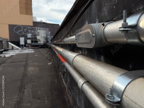 Galvanized Electrical Conduit System with Junction Box on Commercial Rooftop