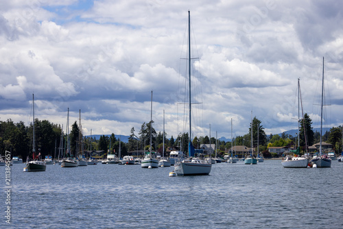 Sailboats Moored in a Calm Marina Under Dramatic Clouds in Sidney, Vancouver Island BC, Canada
