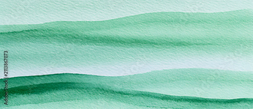 A gradient abstract painting is executed on textured paper with a base of soft green watercolor. Horizontal waves meander across the composition, while delicate watercolor textures build serene layers