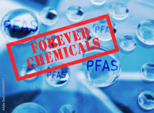 Forever Chemicals stamp text with PFAS water drops -  polyfluoroalkyl contamination concept