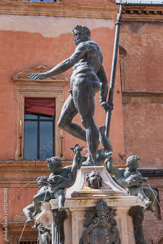 Fountain of Neptune (Fontana del Nettuno) located in the eponymous square, Neptune Square, next to Piazza Maggiore. The fountain was completed in 1565. BOLOGNA, ITALY.