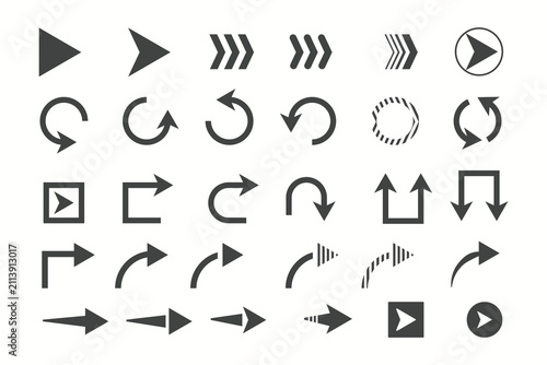 Set of black hand drawn grunge doodle spiral and curved charcoal, chalk arrows on white background. Scribble symbols of direction pointers
