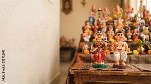 Traditional Indian Bommai Golu dolls display during Navaratri festival featuring wooden cultural artifacts and traditional figurines for festive home decoration