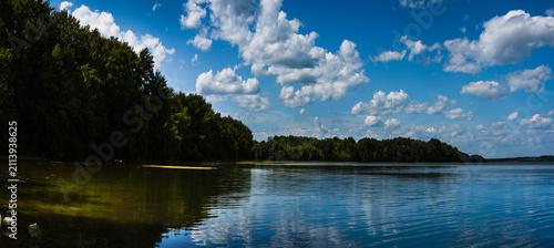 Panoramic Lake Champlain landscape, cloudscape, Mount Independence forest, and water reflection in Ticonderoga, New York, USA