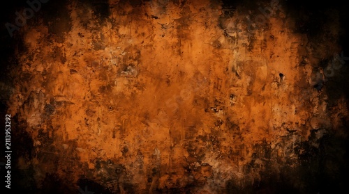 Orange grunge wall texture background. Distressed concrete surface with dark vignette edges.