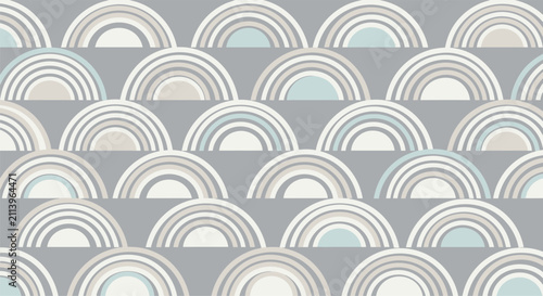 Minimalist geometric seamless pattern featuring rows of stylized overlapping rainbows in muted grey, cream, and light blue tones, suitable for nursery wallpaper and textile design.