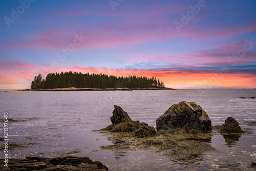 Sticker Sunset over the open sea (calm water)