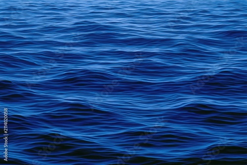 Deep blue water surface with rhythmic, textured ripples