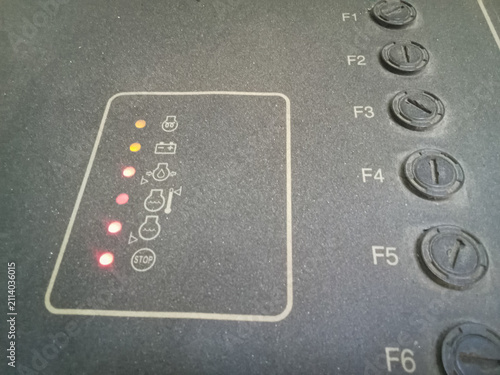 Cuadro en lienzo Industrial equipment control panel interface featuring glowing warning indicator