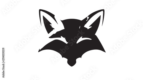 фотографія Silhouette of a playful fox face with pointed ears and bushy tail in black silho
