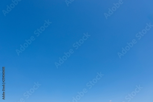 clear blue sky background,clouds with background, Blue sky background with tiny clouds. White fluffy clouds in the blue sky. 