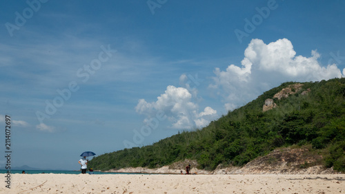 Tropical sea beach in summer time Purple sky on sunny day. Golden sand beach sea peaceful scenery on the beach. Travel vacation seaside outdoor. Ocean island beautiful dramatic Magenta landscape