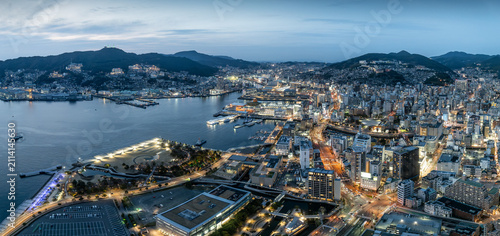 Cuadro en lienzo Aerial view of the city skyline at night in Nagasaki, Japan, a bay city