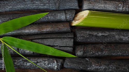 Bamboo charcoal stick on wooden board.