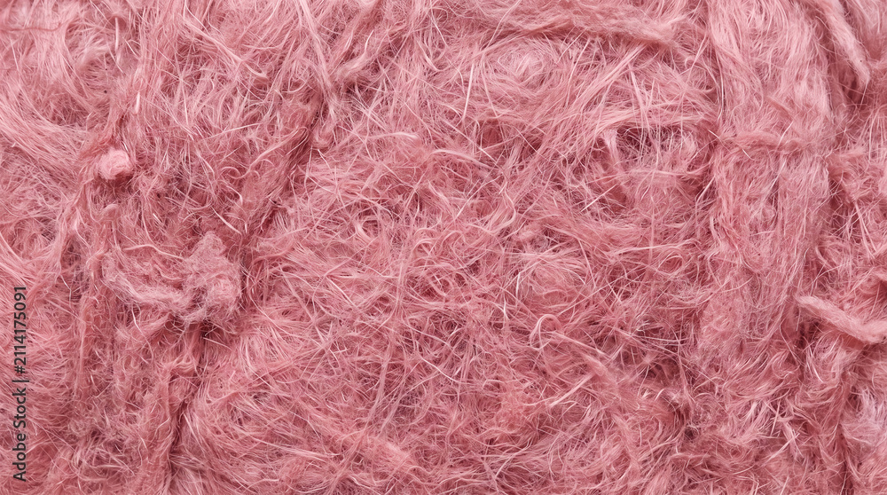 Fototapeta premium Pink fiberglass insulation batt fibres seen up close in fine detail