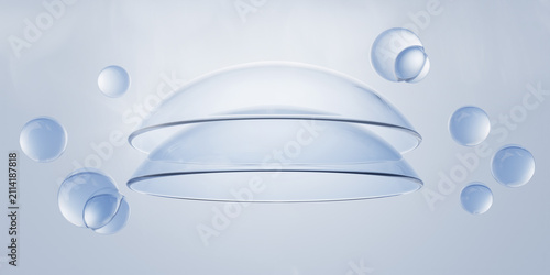 Cuadro en lienzo Contact lenses with clear water bubbles float on soft blue 3d background