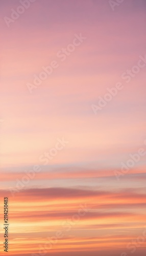 Pastel Sunset Sky: A serene and breathtaking view of a sunset sky painted with soft pastel hues of pink, orange, and lavender, creating a tranquil and dreamlike atmosphere.