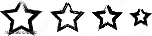 A collection of four various sized star icons created as simple black hand drawn shapes on white