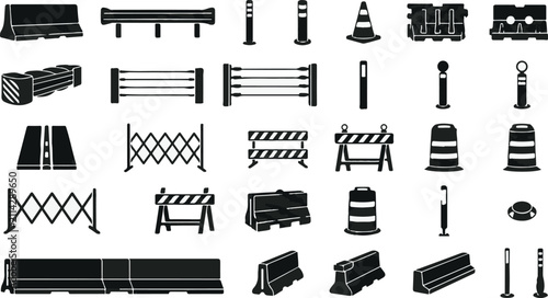 Fotografie Set of black and white road construction barriers and traffic safety equipment i