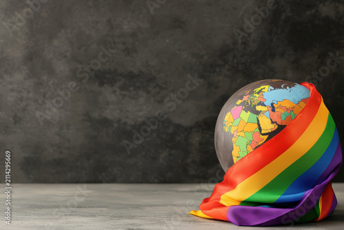 Globe, rainbow, flag, pride, world, map globe wrapped in rainbow flag on gray background symbolizing diversity and unity