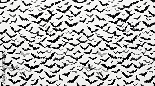 Seamless pattern with black bats isolated on white background
