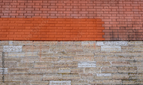 A wall of stone and brick in close-up.